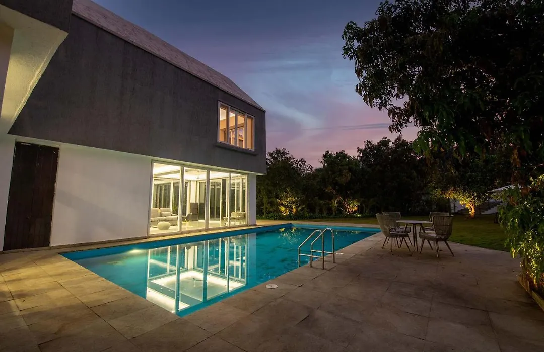 Twilight Grove By Stayvista - Pool- View Villa With Manicured Lawn, Contemporary Interiors & Home Theatre-1